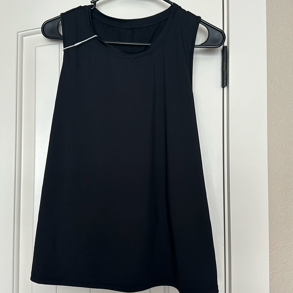 NWOT- tag fell off, but the white hang is still connected. Brand New!!